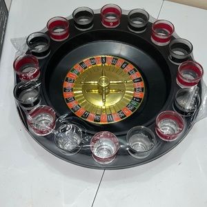 Drinking Roulette contains: one 12” diameter Roulette Board & 16 shot Glasses.